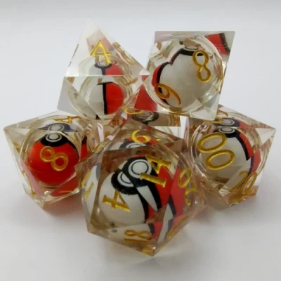 PokÃ©-ball dice kit: translucent with gold numbers in a plastic bottle with screw-cap