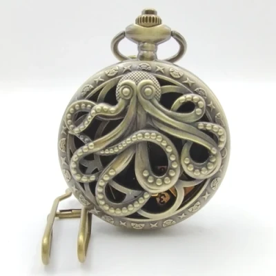 Mini-dice in decorative flip-case: hollow golden kraken in a black suedecloth pouch