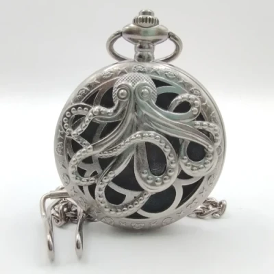Metal pocket dice case with polyhedral mini-kit: hollow silver kraken in a black suedecloth pouch