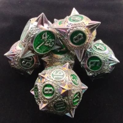 Spiky metal dice: purple silver and green background with black suedecloth bag