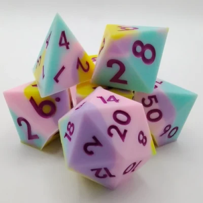 Silicone dice - light blue, pink, yellow, and white with purple numbers