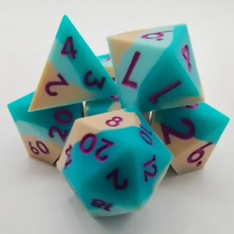 Silicone dice - blue, light green, and peach with fuschia numbers