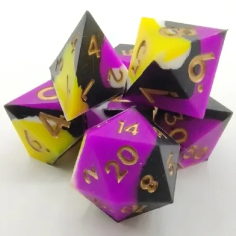 Silicone dice - yellow, white, and black with gold numbers