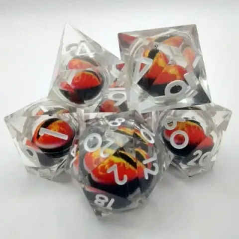 Dragon Eye dice kit - translucent with red dragon eye in a bottle with screw-cap