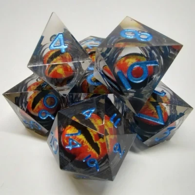 Liquid Core Dragon Eye dice kit - smoke and orange in a bottle with screw-cap