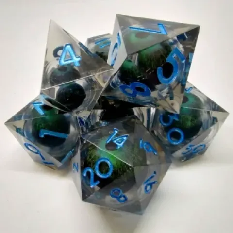 Demon Eye dice kit - black with green eye in a bottle with screw-cap