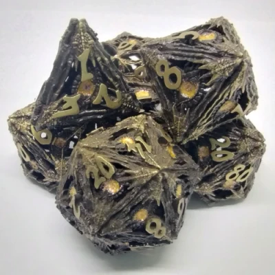 Devil-Eye Dice Kit - Brushed gold with shimmering orange eye in a metal box