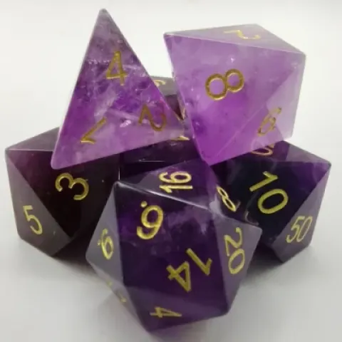 Semi-precious gems: amethyst in a black metal box