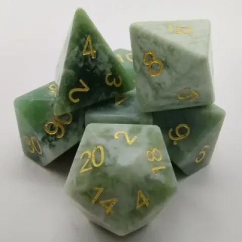 Semi-precious gems: jade in a black metal box